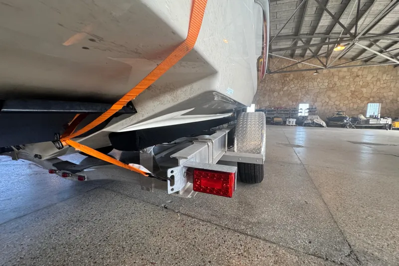 Slide: The Image of Indoor storage of various boats, featuring a 2017 Formula 240 Bowrider. - 78