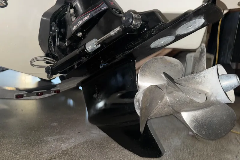 Slide: The Image of Close-up of a 2017 Formula 240 Bowrider's MerCruiser propeller and outdrive. - 90