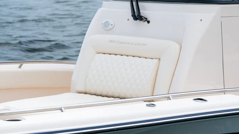 Slide: The Image of Grady-White 281 Coastal Explorer 2026, luxurious seating by the water. - 13