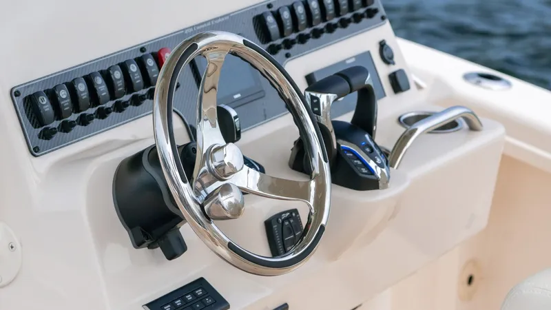 Slide: The Image of Steering console of the 2026 Grady-White 281 Coastal Explorer. - 19