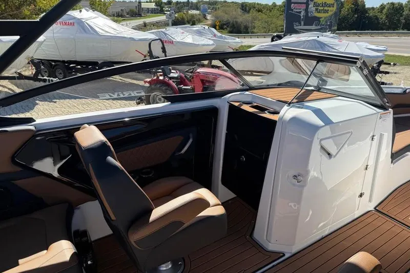 Slide: The Image of 2026 Yamaha Boats 252SD interior with sleek design and comfortable seating. - 11
