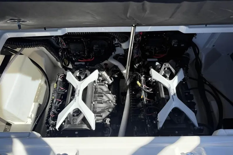 Slide: The Image of Engine compartment of 2026 Yamaha Boats 252SD, showcasing dual engines and components. - 14