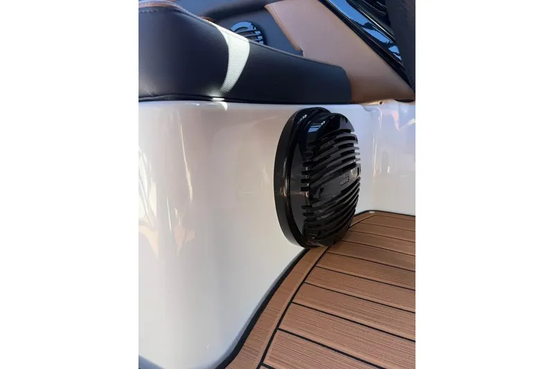 Slide: The Image of 2026 Yamaha Boats 252SD interior speaker detail on sleek, modern deck. - 16