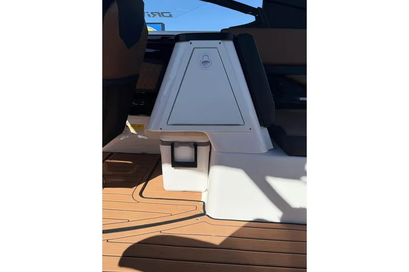 Slide: The Image of 2026 Yamaha Boats 252SD interior with sleek design and wooden flooring. - 19