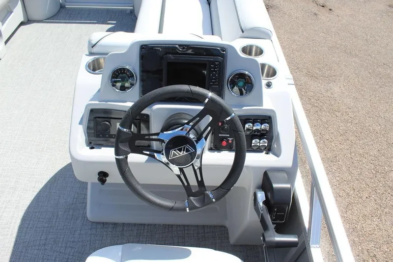 Slide: The Image of Steering console of 2025 Avalon Venture 85 Versatile Rear Bench 23 FT boat. - 18