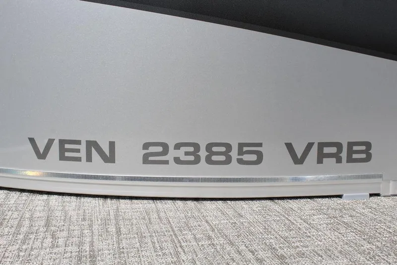 Slide: The Image of 2025 Avalon Venture 85 Versatile Rear Bench 23 FT boat model label. - 21