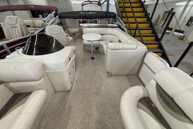 Slide: The Image of Luxurious 2009 South Bay 722 FCR pontoon boat interior with plush seating and elegant design. - 22