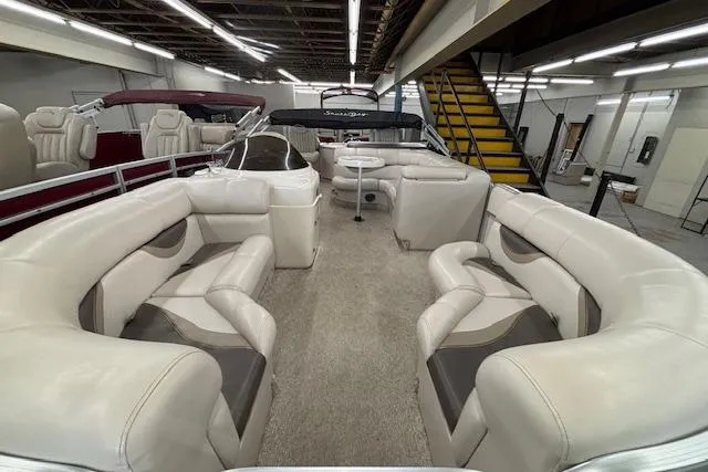 Slide: The Image of Luxurious 2009 South Bay 722 FCR pontoon boat with spacious seating and elegant interior design. - 23
