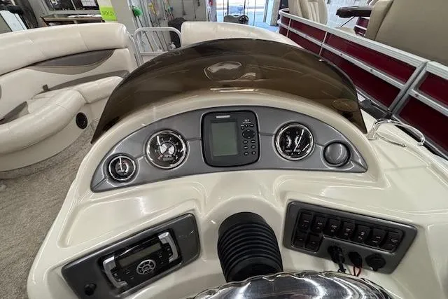 Slide: The Image of Dashboard of 2009 South Bay 722 FCR boat with gauges and controls. - 6