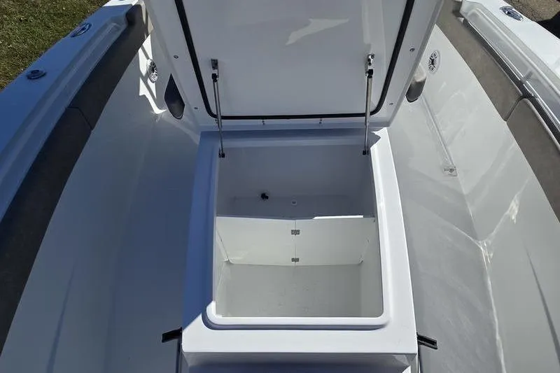 Slide: The Image of Open storage compartment on 2026 Sea Hunt Ultra 285 SE boat. - 21