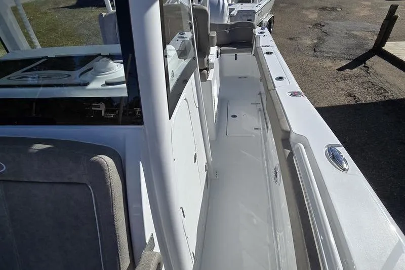 Slide: The Image of 2026 Sea Hunt Ultra 285 SE boat interior, showcasing sleek design and spacious layout. - 22