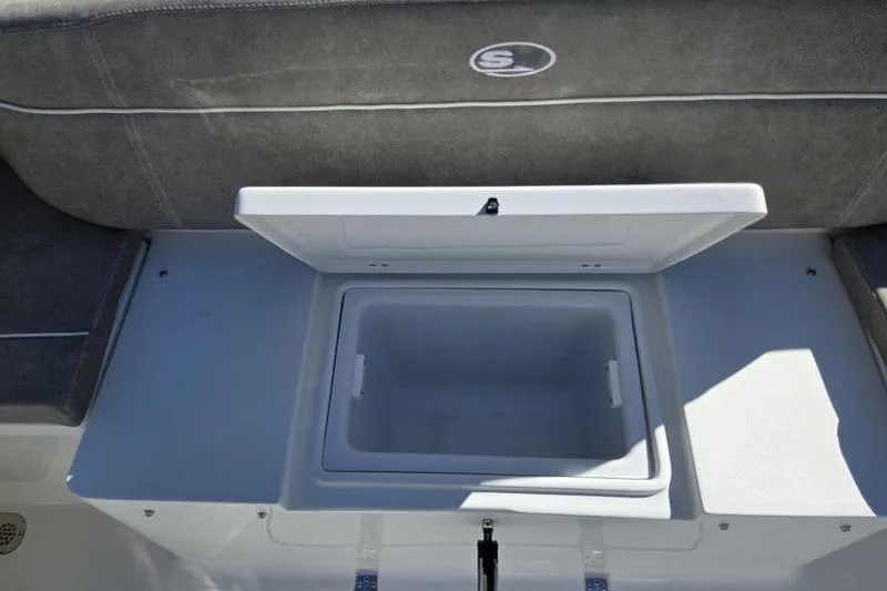 Slide: The Image of Open storage compartment on 2026 Sea Hunt Ultra 285 SE boat. - 24