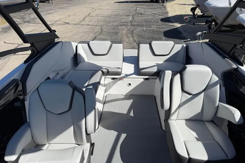 Slide: The Image of 2026 Yamaha Boats AR250 interior with modern seating and sleek design. - 12