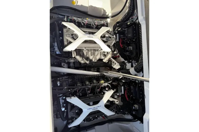 Slide: The Image of 2026 Yamaha AR250 boat engine compartment with dual high-output engines. - 13