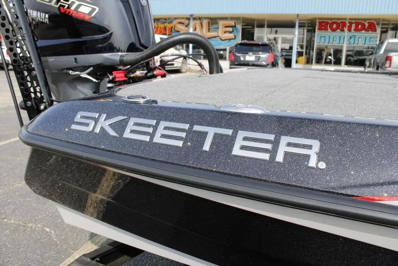 Slide: The Image of 2026 Skeeter ZXE21 boat with Yamaha VMAX engine at dealership. - 27