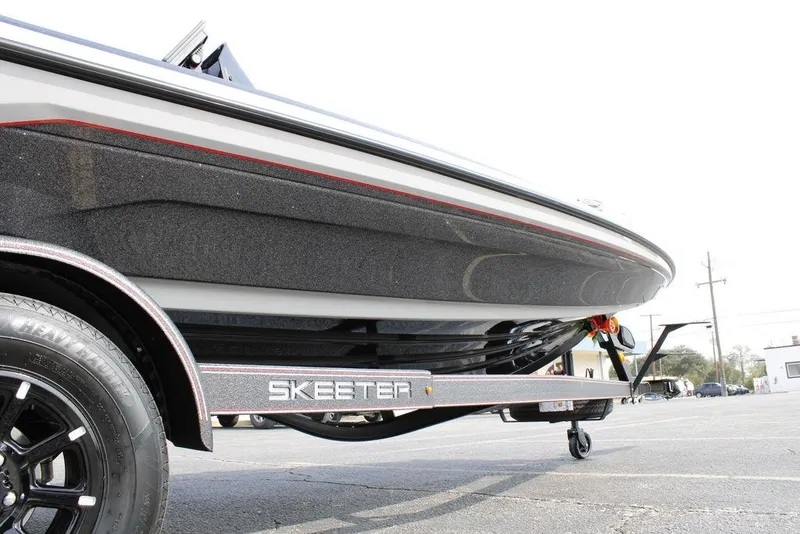 Slide: The Image of 2026 Skeeter ZXE21 boat on trailer, showcasing sleek design and modern features. - 31