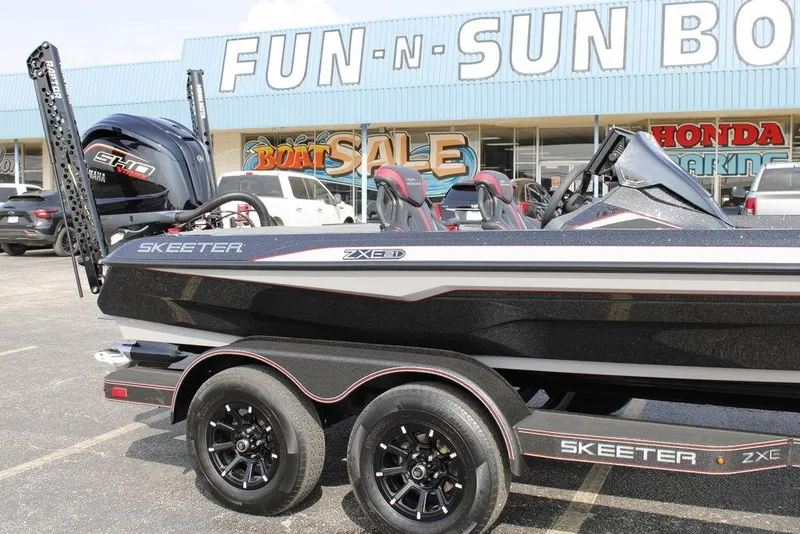 Slide: The Image of 2026 Skeeter ZXE21 boat at dealership, featuring sleek design and modern features. - 5