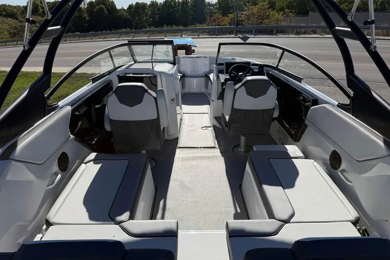 Slide: The Image of 2026 Yamaha Boats AR250 interior with sleek seating and modern design. - 7
