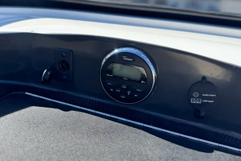 Slide: The Image of Dashboard of 2019 Bayliner 180 Bowrider with Jensen audio system and USB input. - 19
