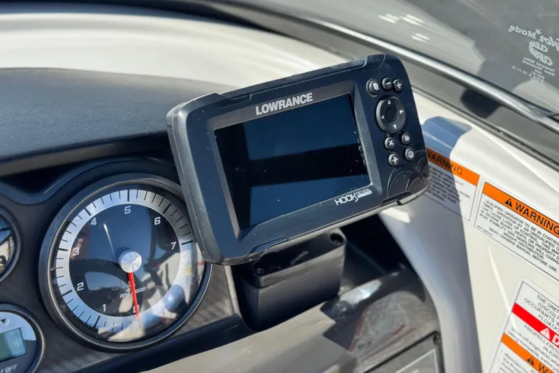Slide: The Image of Dashboard of 2019 Bayliner 180 Bowrider with Lowrance Hook fishfinder and tachometer. - 22