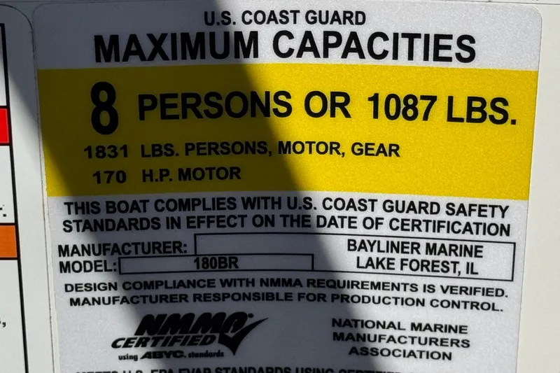 Slide: The Image of 2019 Bayliner 180 Bowrider capacity label, 8 persons or 1087 lbs, 170 HP motor. - 25