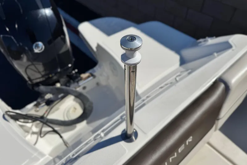 Slide: The Image of 2019 Bayliner 180 Bowrider boat with engine and stainless steel ski tow pylon. - 9