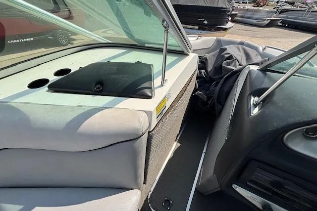 Slide: The Image of 2007 Centurion Air Warrior T5 boat interior with windshield and seating area. - 11