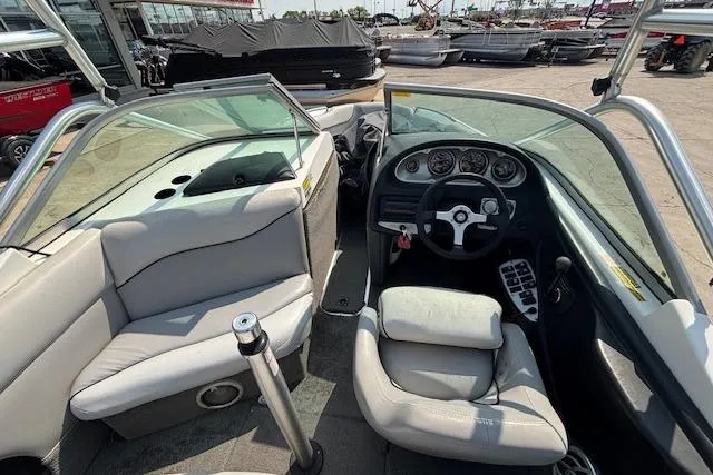 Slide: The Image of 2007 Centurion Air Warrior T5 boat interior with steering wheel and seating. - 19