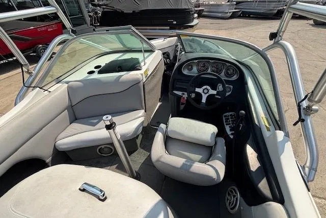 Slide: The Image of 2007 Centurion Air Warrior T5 boat interior with steering wheel and seating. - 20