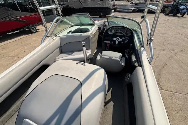 Slide: The Image of 2007 Centurion Air Warrior T5 boat interior with steering wheel and seating. - 21