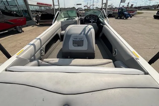 Slide: The Image of 2007 Centurion Air Warrior T5 boat interior with gray seating and dashboard view. - 22