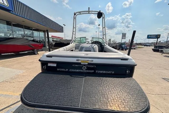 Slide: The Image of 2007 Centurion Air Warrior T5 boat at dealership, showcasing rear deck and branding. - 23