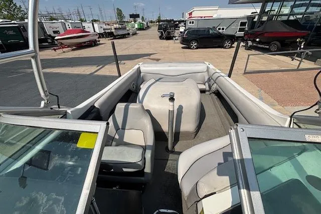 Slide: The Image of 2007 Centurion Air Warrior T5 boat interior with seating and open deck view. - 9