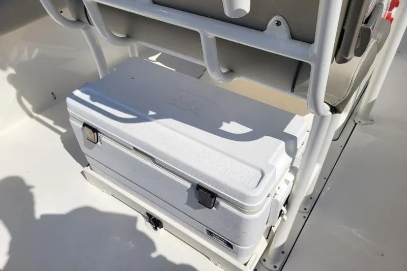 Slide: The Image of 2023 Key West 244 Center Console boat with cooler storage under seat. - 9