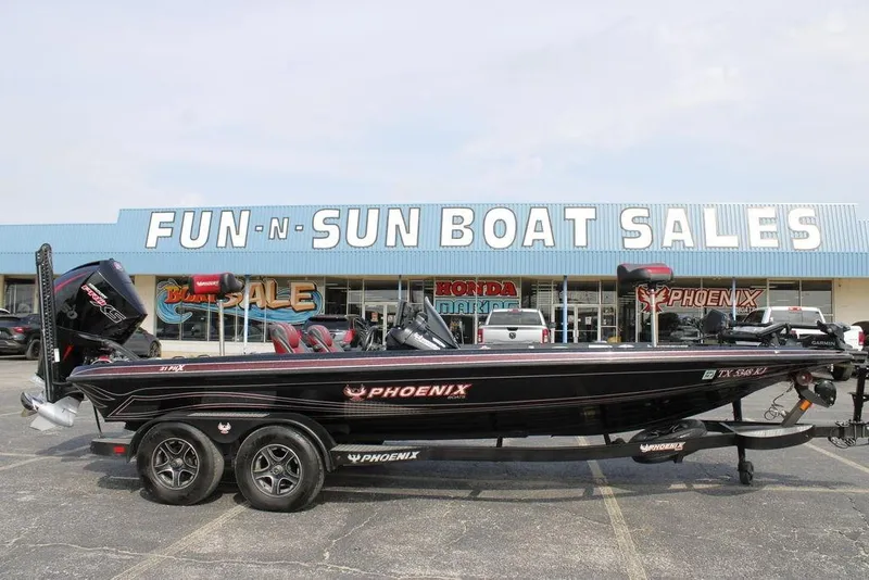 Slide: The Image of 2021 Phoenix 21 PHX boat at Fun-N-Sun Boat Sales dealership. - 1