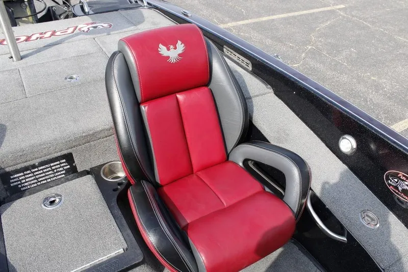 Slide: The Image of Red and black seat in 2021 Phoenix 21 PHX boat interior. - 13