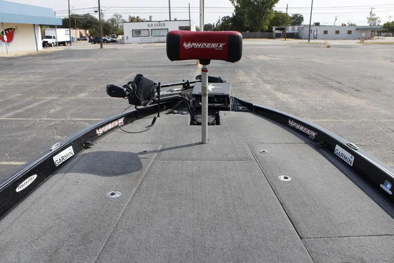 Slide: The Image of 2021 Phoenix 21 PHX boat deck with Garmin equipment in a parking lot. - 16