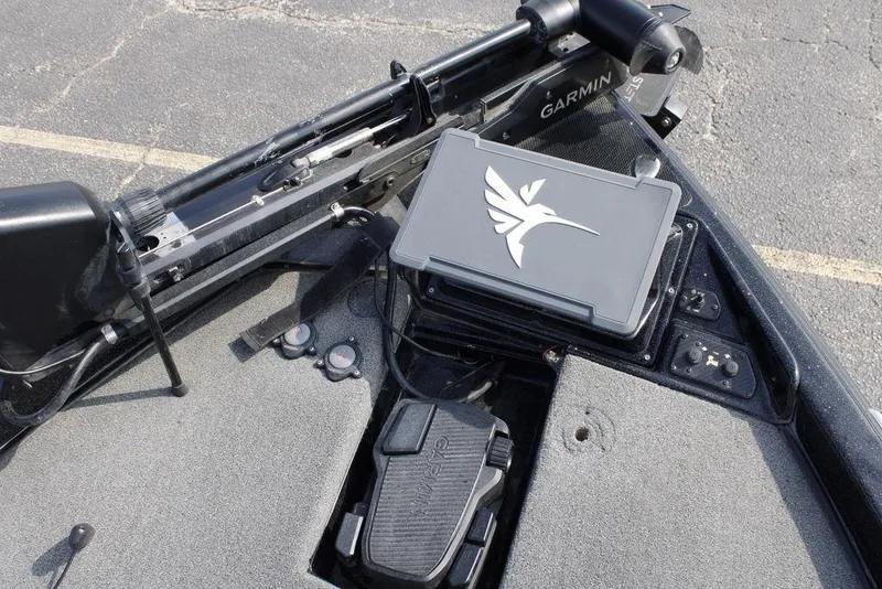 Slide: The Image of 2021 Phoenix 21 PHX boat deck with Garmin equipment and control panel. - 19