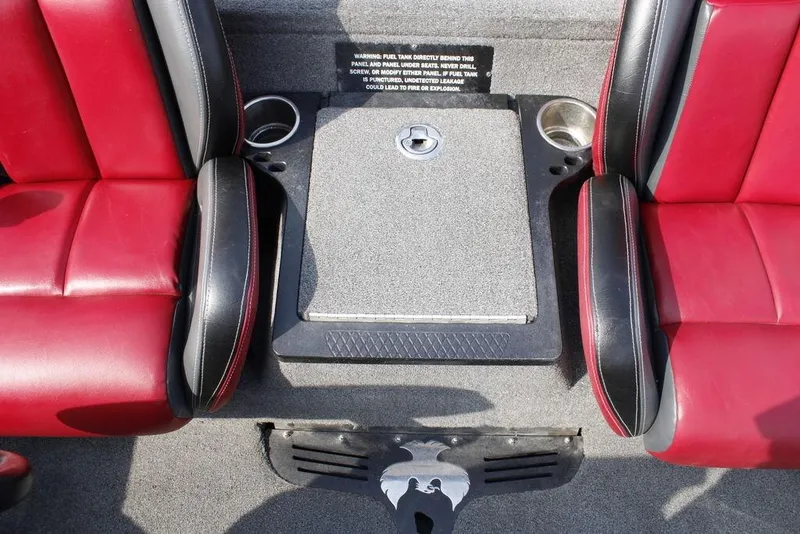 Slide: The Image of Red and black seats in a 2021 Phoenix 21 PHX boat interior. - 21