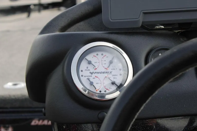 Slide: The Image of Dashboard gauge of 2021 Phoenix 21 PHX boat showing fuel, water, and voltage levels. - 27