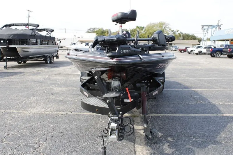 Slide: The Image of Front view of a 2021 Phoenix 21 PHX boat with Garmin equipment in a parking lot. - 3