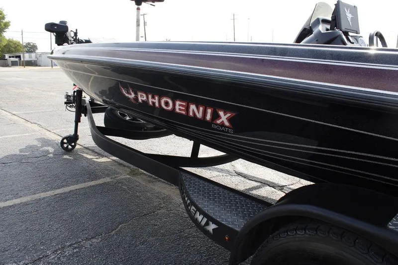 Slide: The Image of 2021 Phoenix 21 PHX boat on trailer in parking lot. - 32