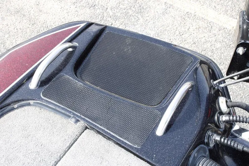 Slide: The Image of 2021 Phoenix 21 PHX boat deck with textured surface and metal handles. - 34