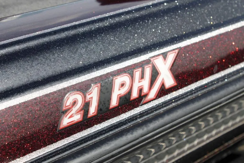 Slide: The Image of Close-up of 2021 Phoenix 21 PHX boat model with glittery finish. - 6