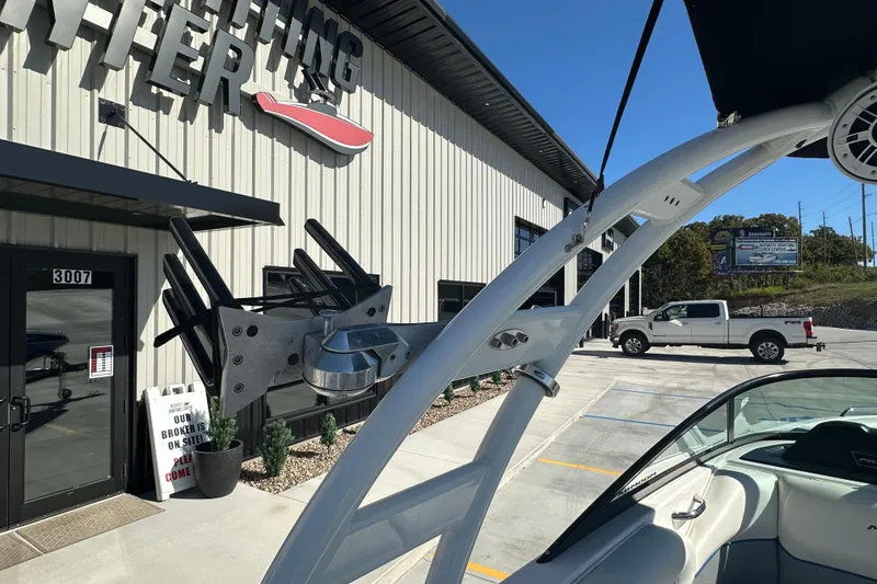 Slide: The Image of 2015 Moomba Mobius LSV boat interior with blue and white seating. - 21