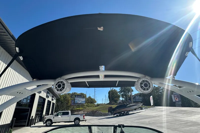 Slide: The Image of 2015 Moomba Mobius LSV boat interior with blue and white seating. - 22