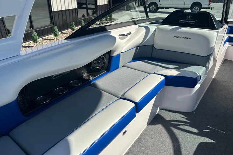 Slide: The Image of 2015 Moomba Mobius LSV boat dashboard with steering wheel and gauges. - 25