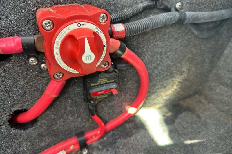 Slide: The Image of 2015 Moomba Mobius LSV boat interior with steering wheel and dashboard controls. - 26