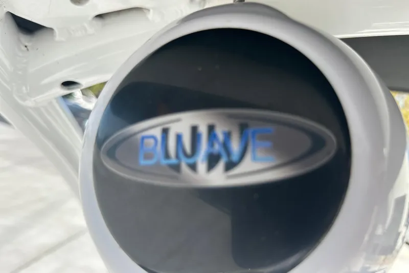 Slide: The Image of 2015 Moomba Mobius LSV boat interior with gray and blue seating. - 30