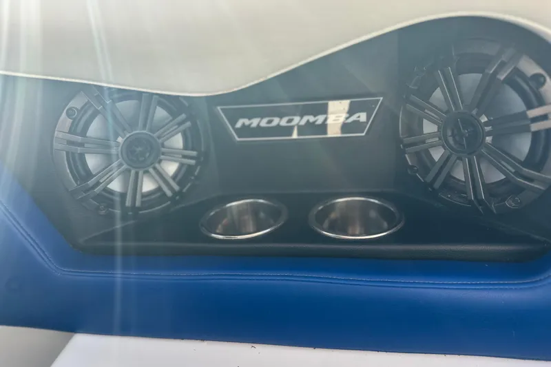 Slide: The Image of 2015 Moomba Mobius LSV interior detail with white and blue upholstery. - 34